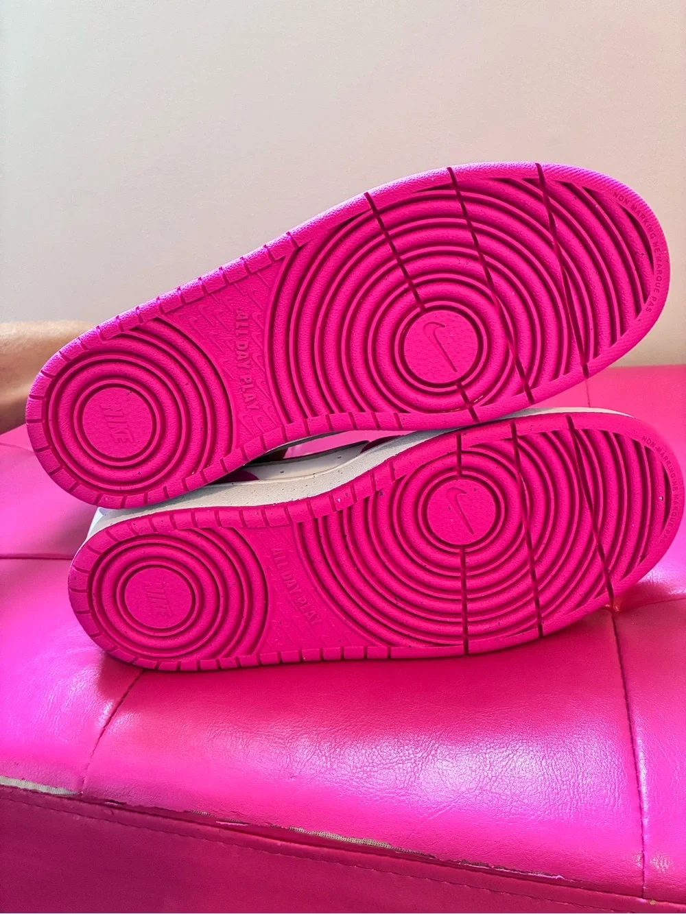 Nike perforated logo accents
